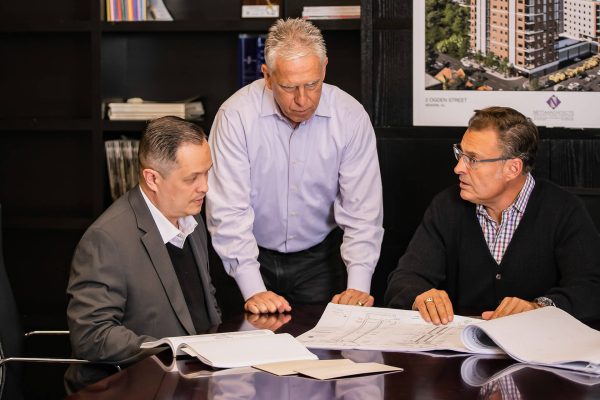 Netta-Team-Reviewing-Documents-1-600x400